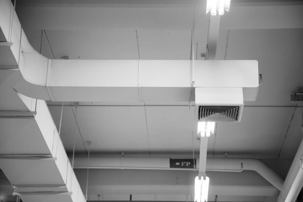 A Black And White Photo Of A Ceiling — Jordan Wheatland Air Conditioning & Refrigeration In Dubbo, NSW