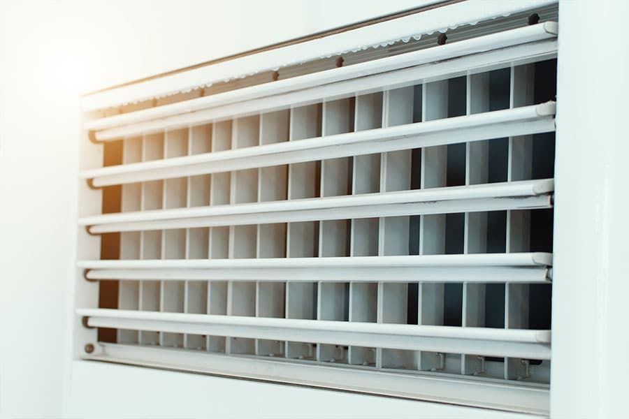 A Close Up Of A White Air Vent On A Wall — Jordan Wheatland Air Conditioning & Refrigeration In Dubbo, NSW