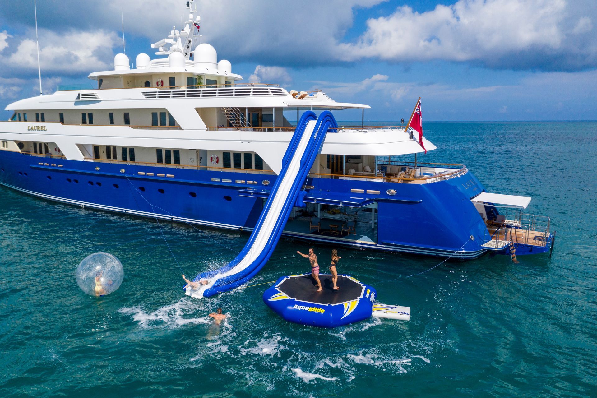 Aerial view of motor yacht Laurel with tenders and water toys