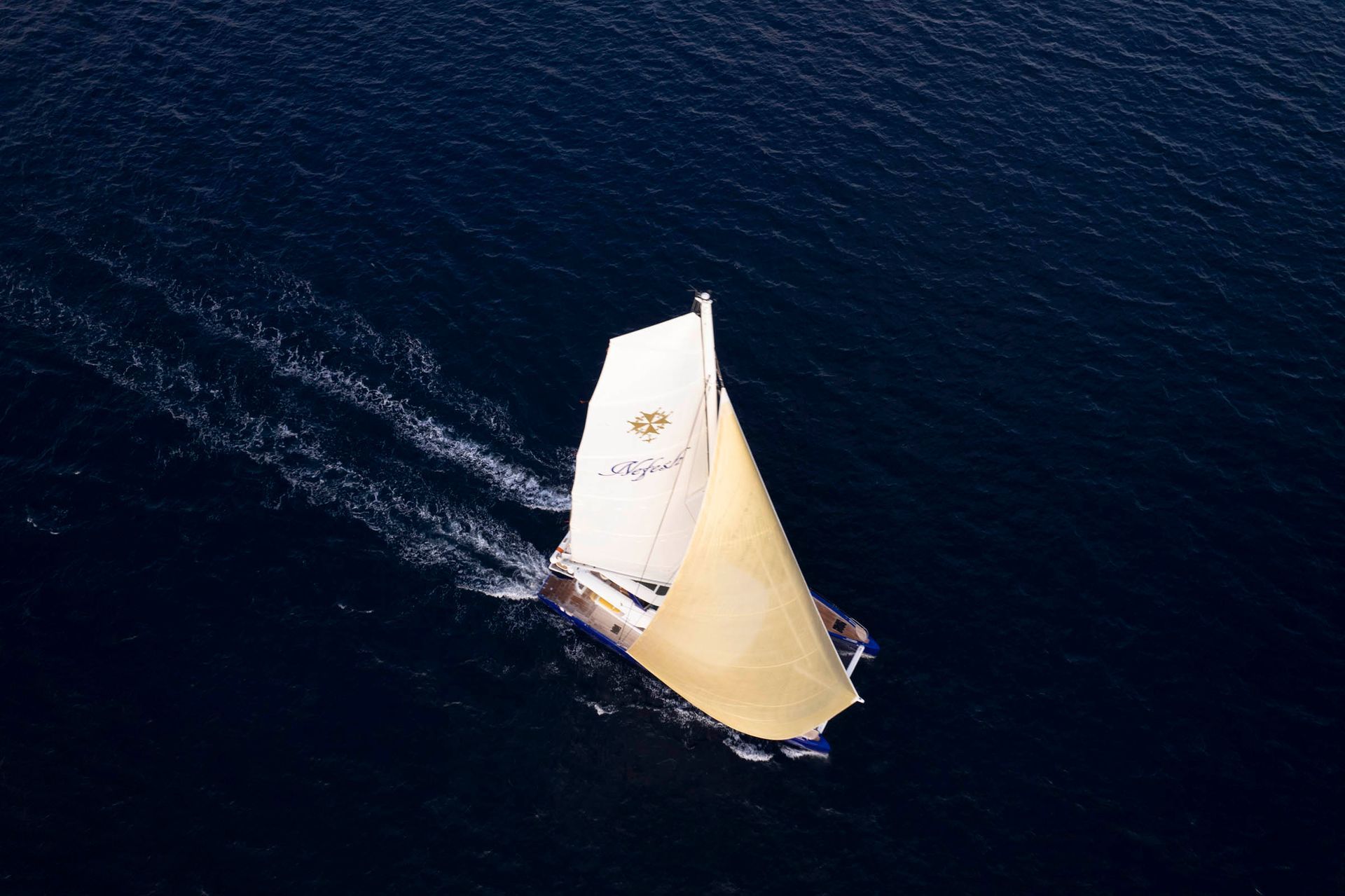 Top-down aerial view of sailing yacht Nefesh underway