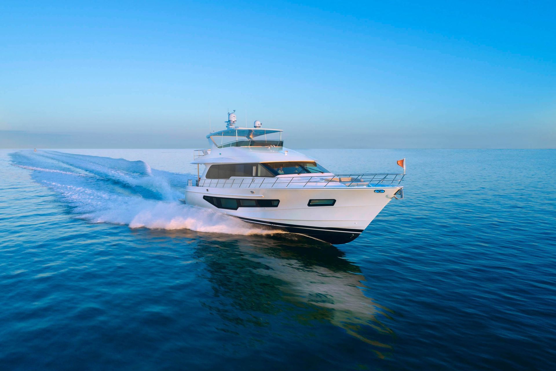 Motor yacht at sunset in an aerial photograph