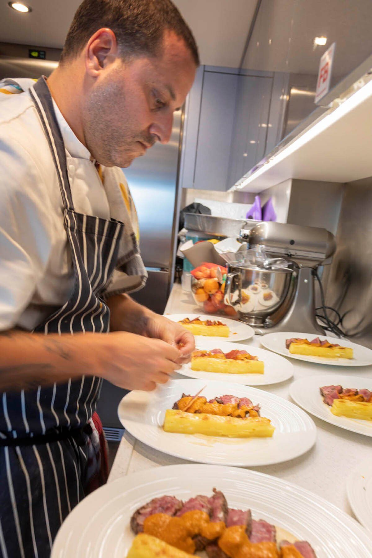 Chef preparing dishes for banquet service