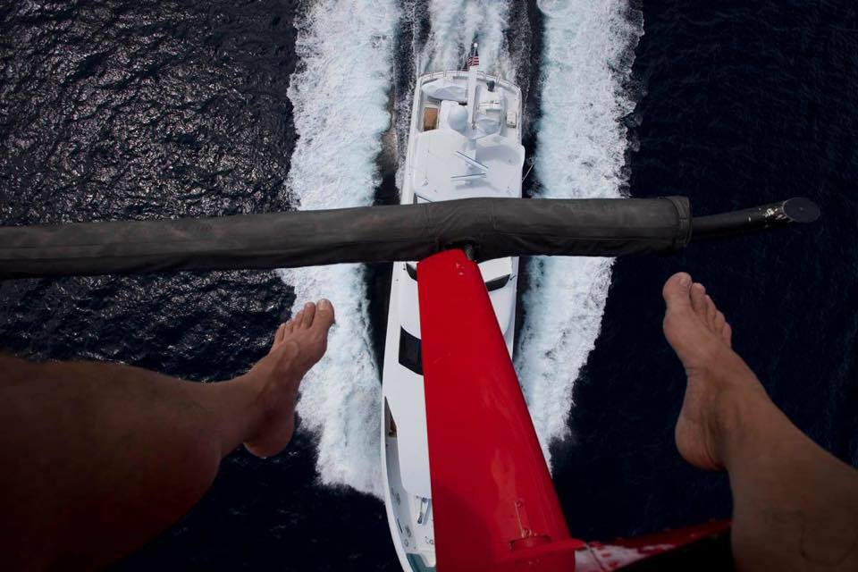 Aerial production view from a helicopter above a yacht