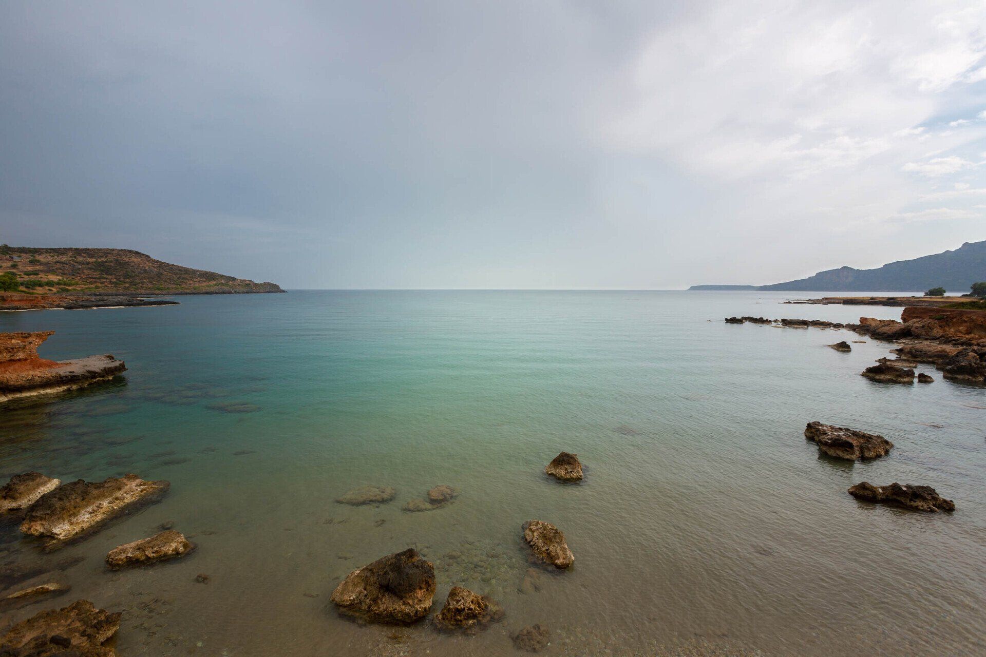 Person looking across the sea in the Peloponnese, Greece