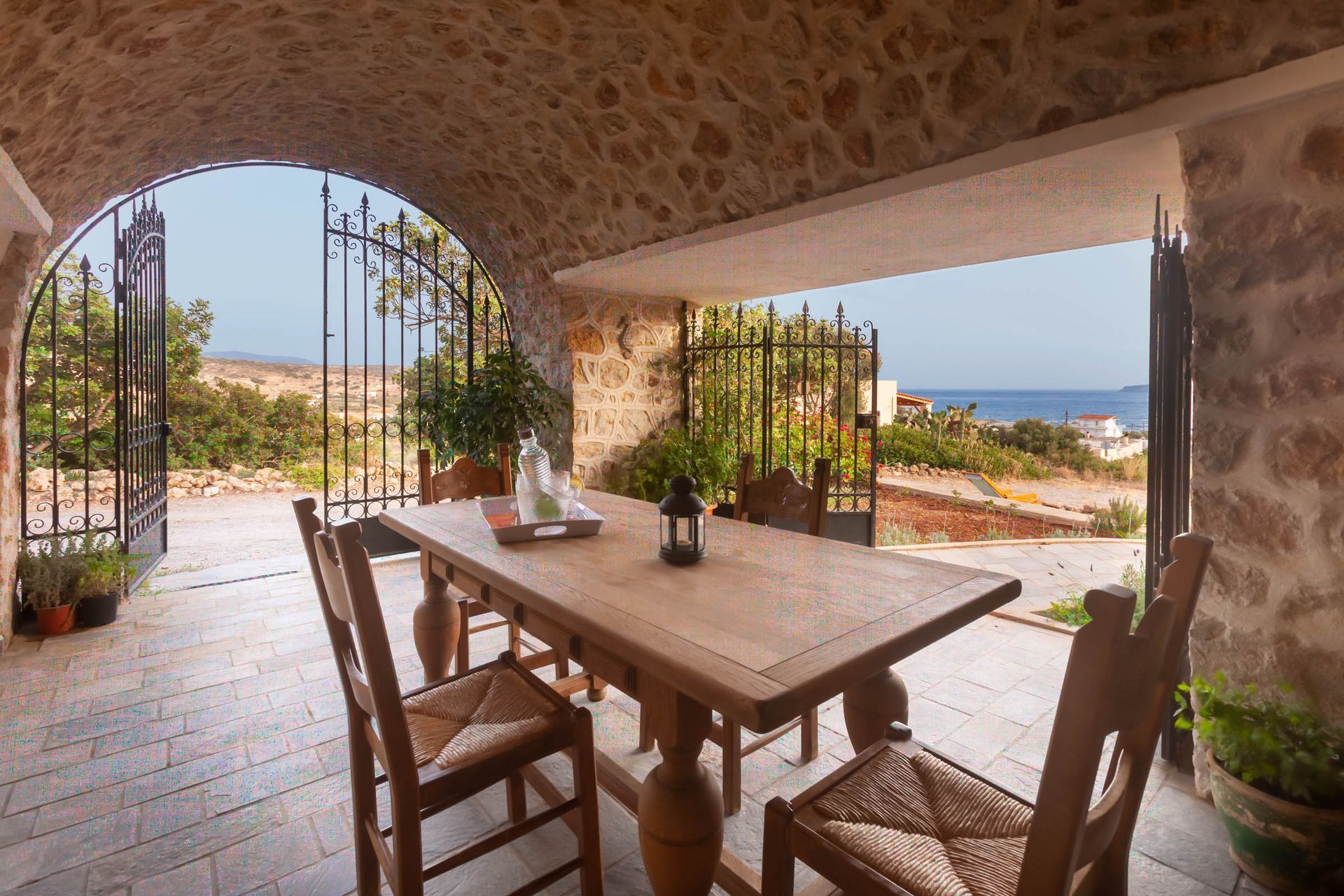 Stone hospitality terrace overlooking the sea