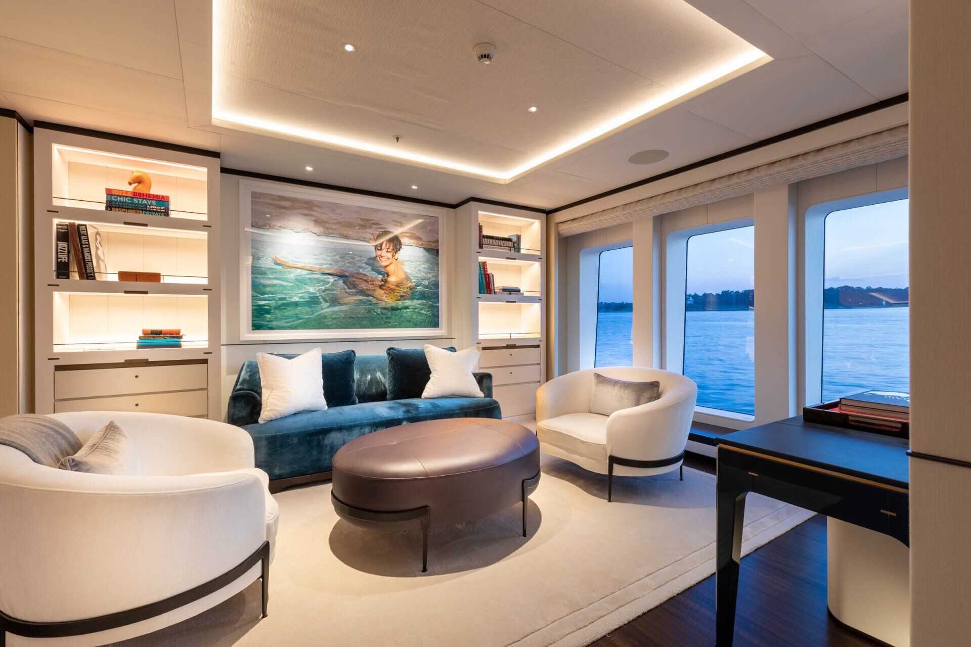 Settee and shelving in the master suite of motor yacht Hasna