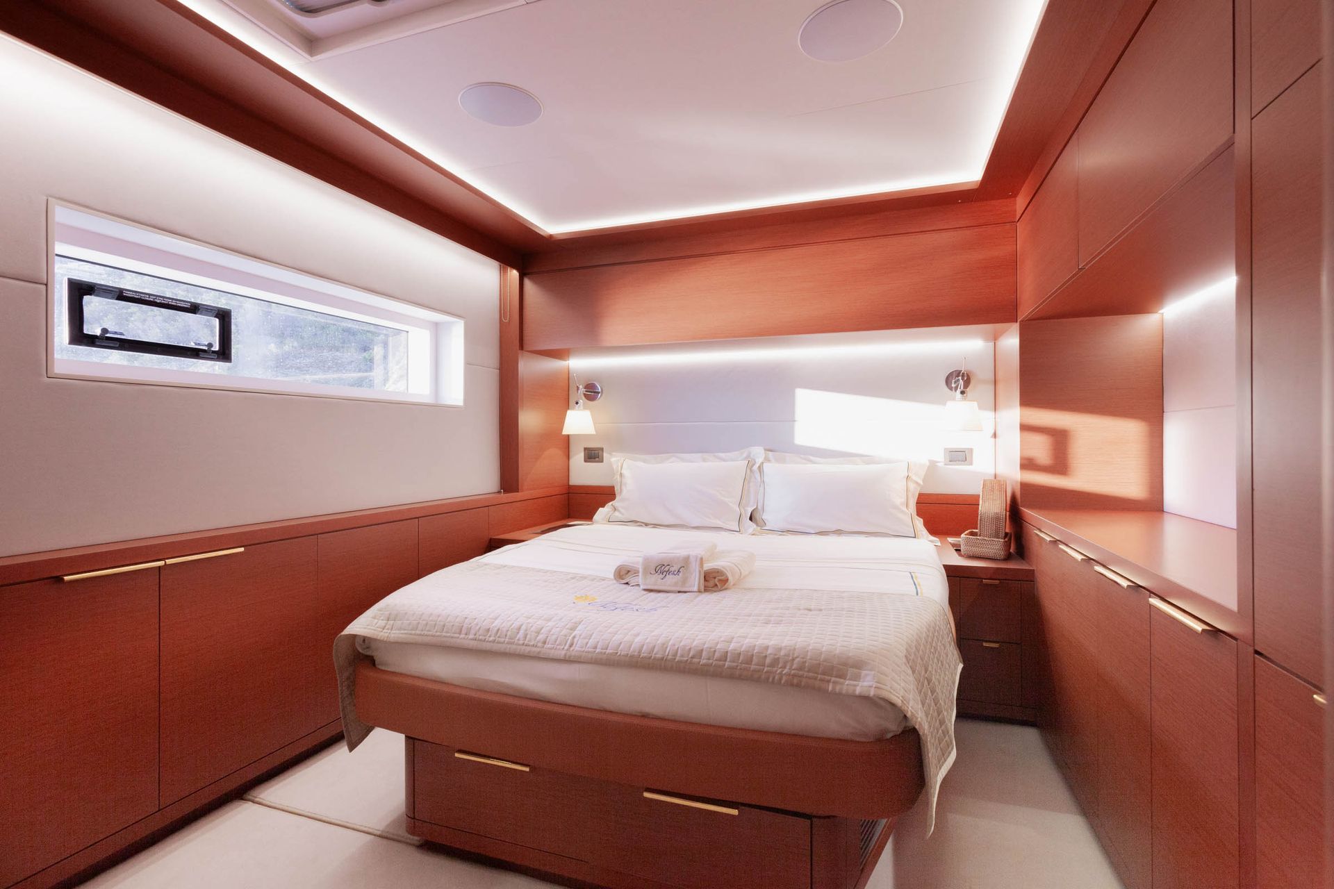 Double guest cabin with warm integrated lighting and timber finishes