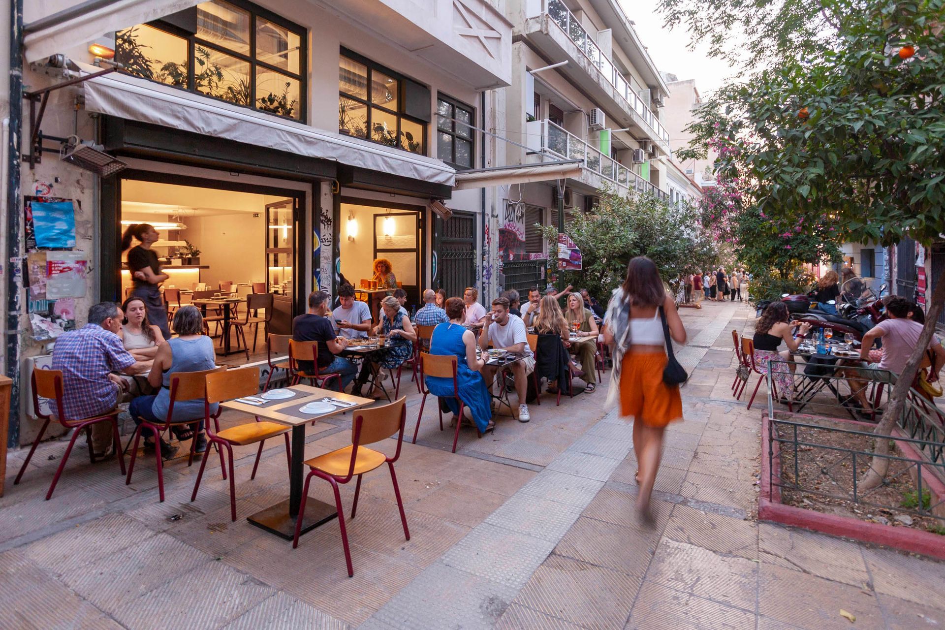 Busy outdoor restaurant on a pedestrian street
