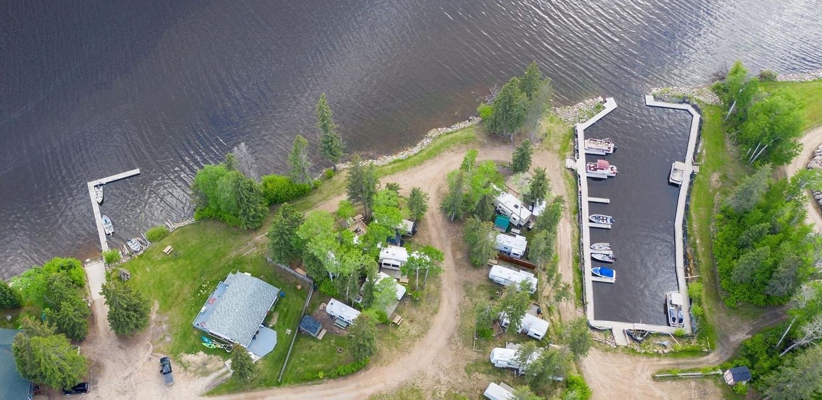 An aerial view of a small island in the middle of a lake.
