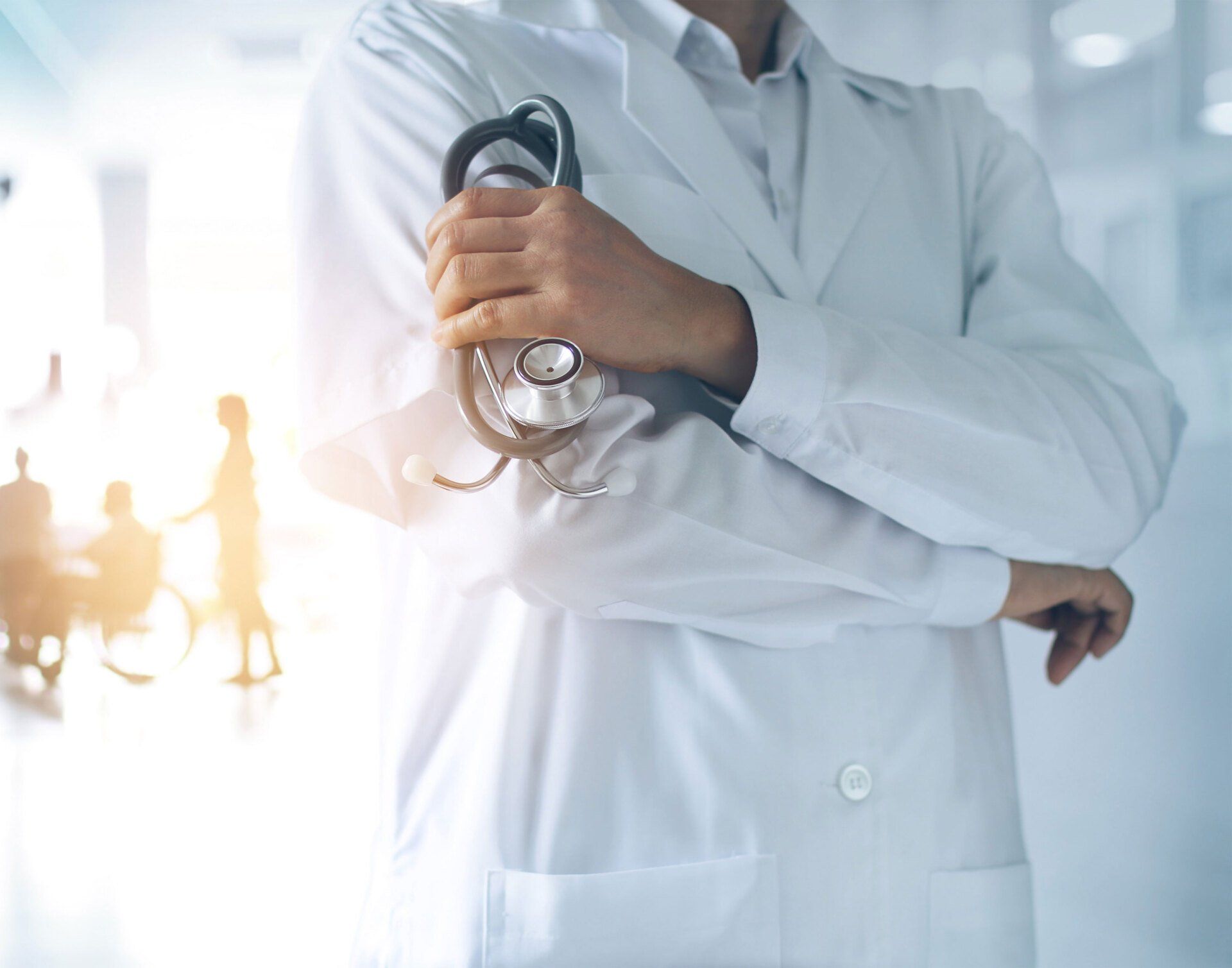 Doctor Holding Stethoscope | Perrysburg, OH | Toledo Surgical Associates, Inc.