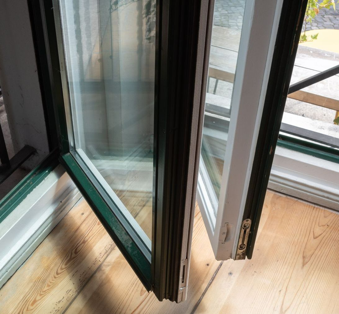Double-paned Window With a Green Frame and White Interior — Long Jetty Glass in The Entrance, NSW