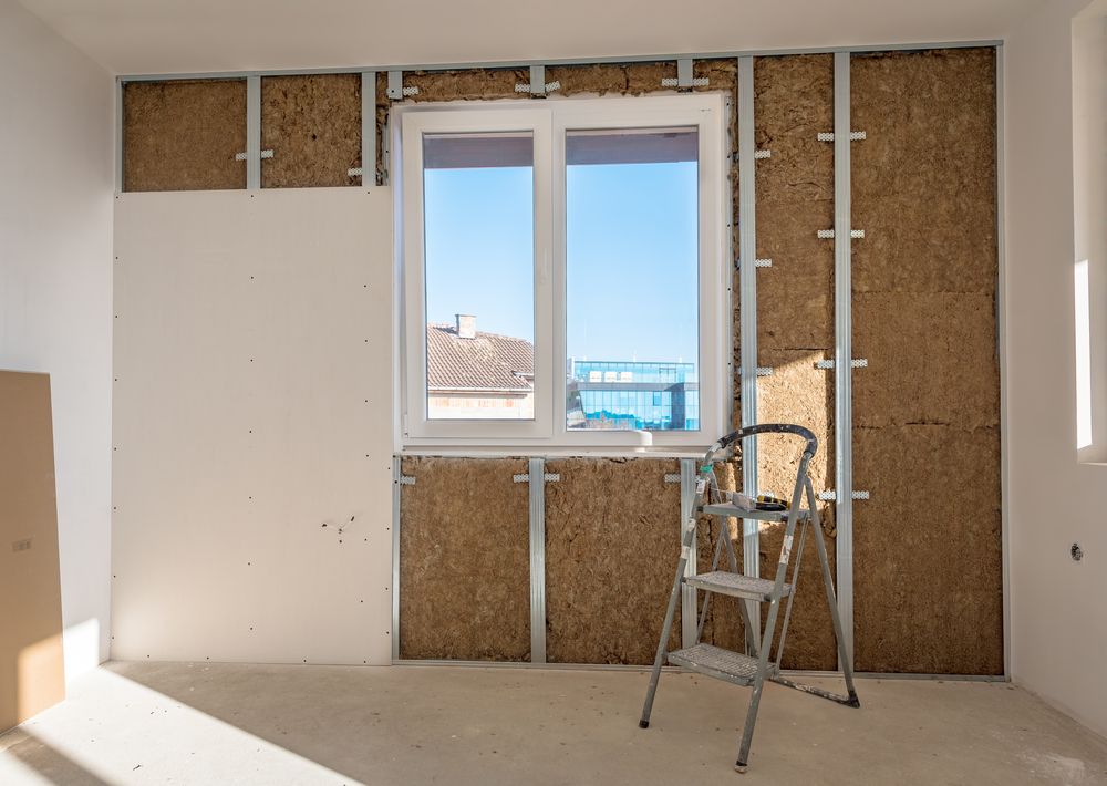 Interior View of a Room Under Construction With Exposed Wall Studs — Long Jetty Glass in The Entrance, NSW