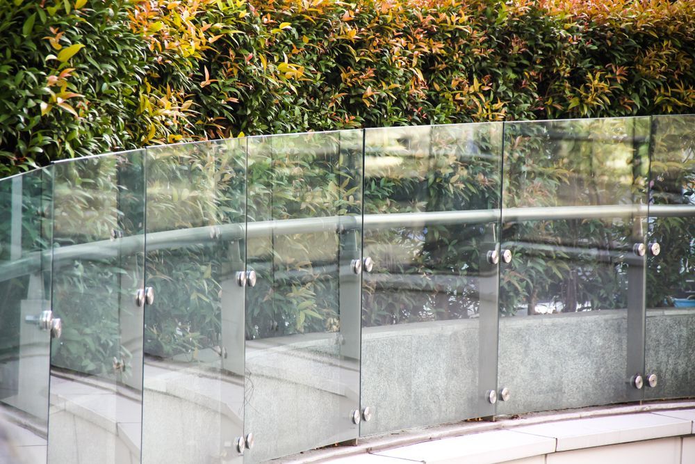 Glass Railing With Metal Supports, Curved Concrete Base — Long Jetty Glass in The Entrance, NSW