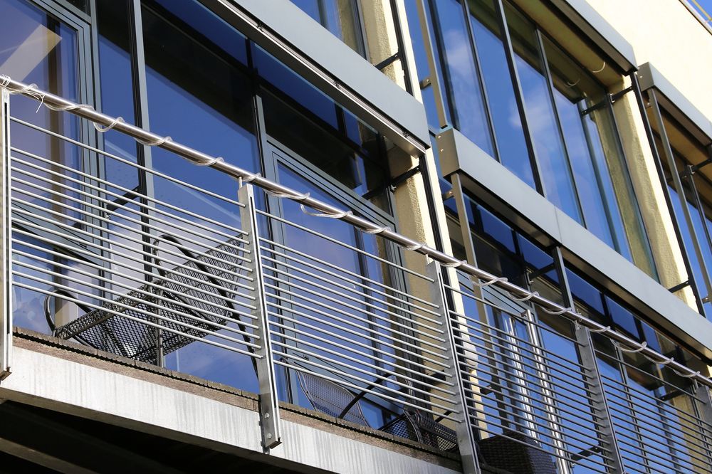 A Modern Building With Large Windows Reflecting the Sky — Long Jetty Glass in The Entrance, NSW