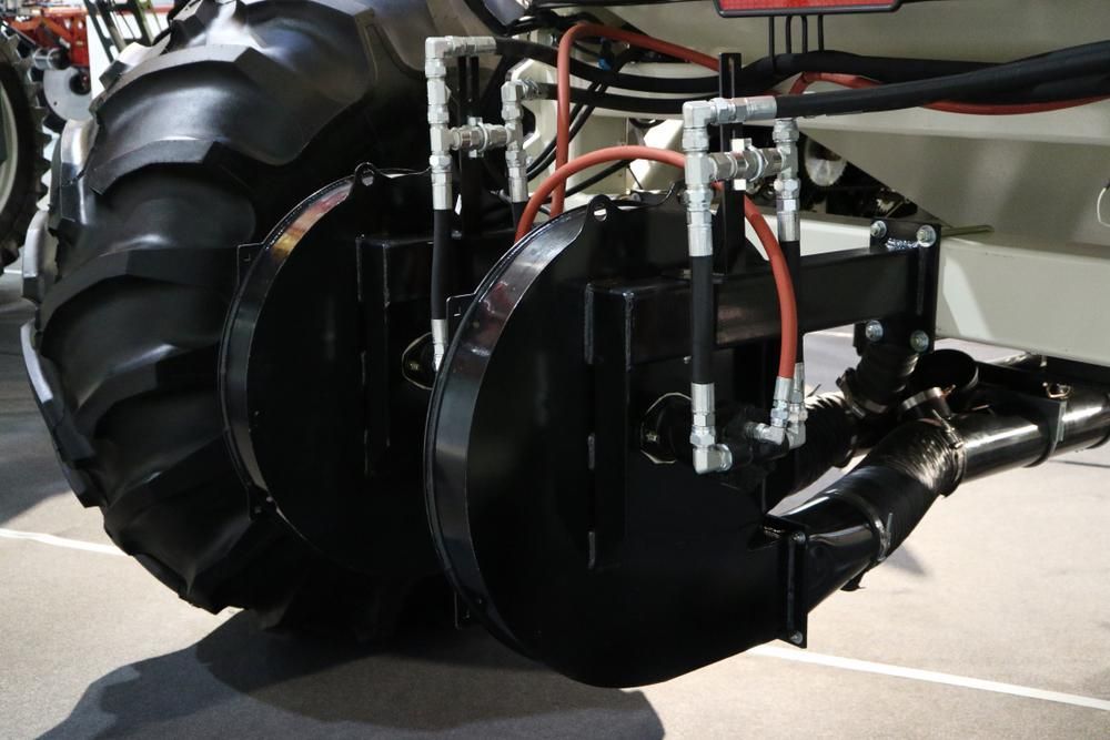 A Close up Of a Tractor with A Large Tire — Cheshire Machinery in Murgon, QLD