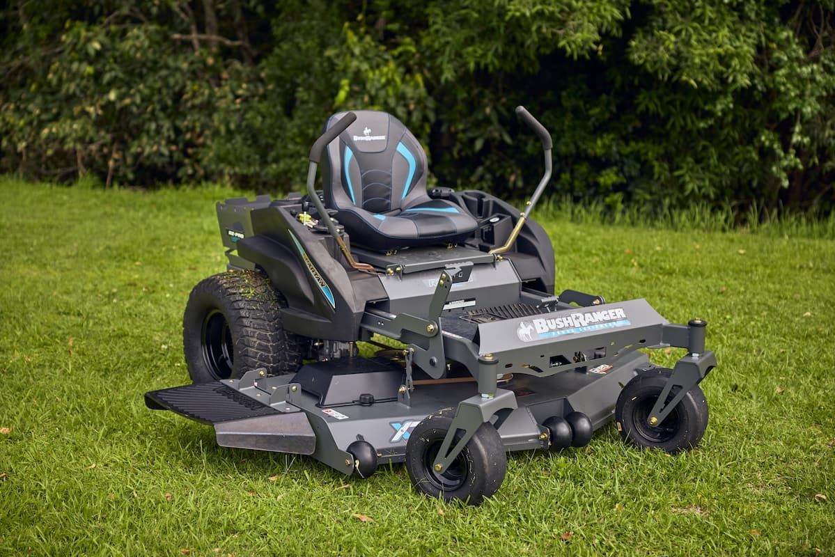 A Lawn Mower Is Sitting on Top of A Lush Green Lawn — Cheshire Machinery in Murgon, QLD