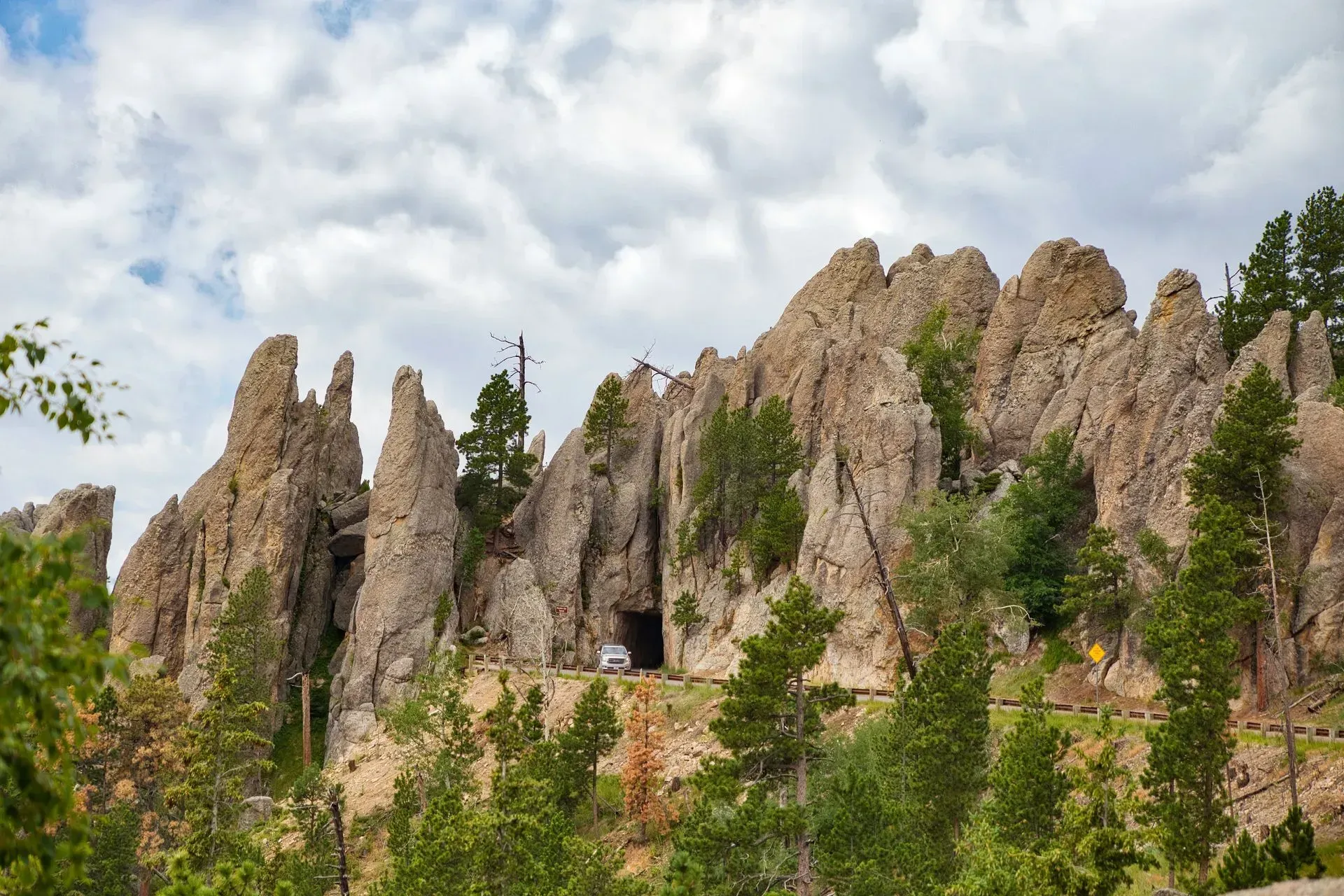A large rock is sitting in the middle of a cave.