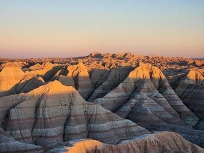 A desert landscape with a lot of rocks and mountains