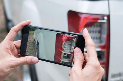 Taking a photo of shattered car lights — Fall River, MA — Collision Repair Shop