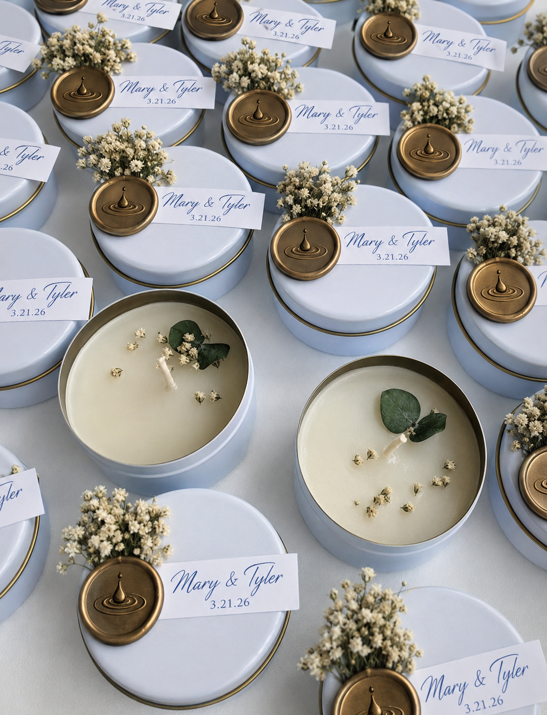  A warm, elegant thank-you gift your guests will love—these candle tins can be personalized with names and a date for a meaningful keepsake. 