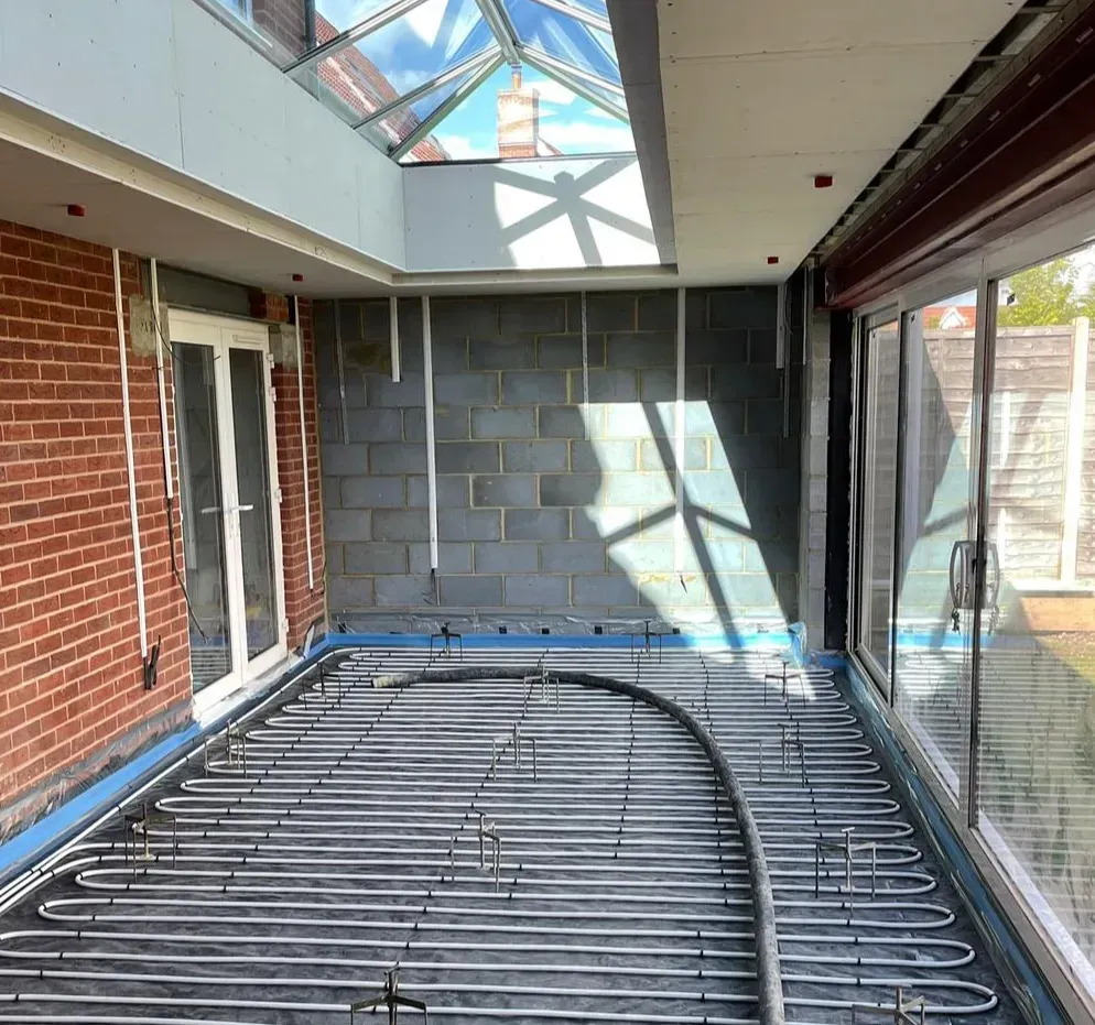 Newly-built extension with underfloor heating, ready for screed to be installed.