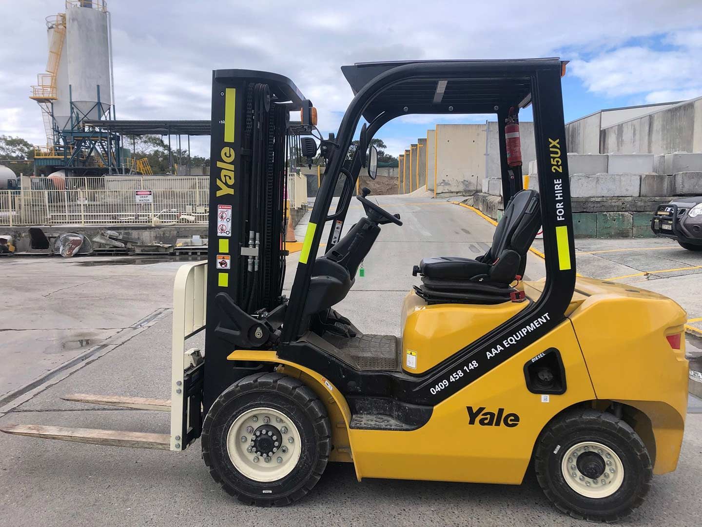 A Yellow Yale Forklift Is Parked in A Parking Lot — AAA Equipment Pty Ltd In Redbank, NSW
