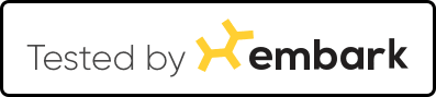 A white sign that says tested by x embark
