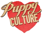 A red heart with the words puppy culture written on it.