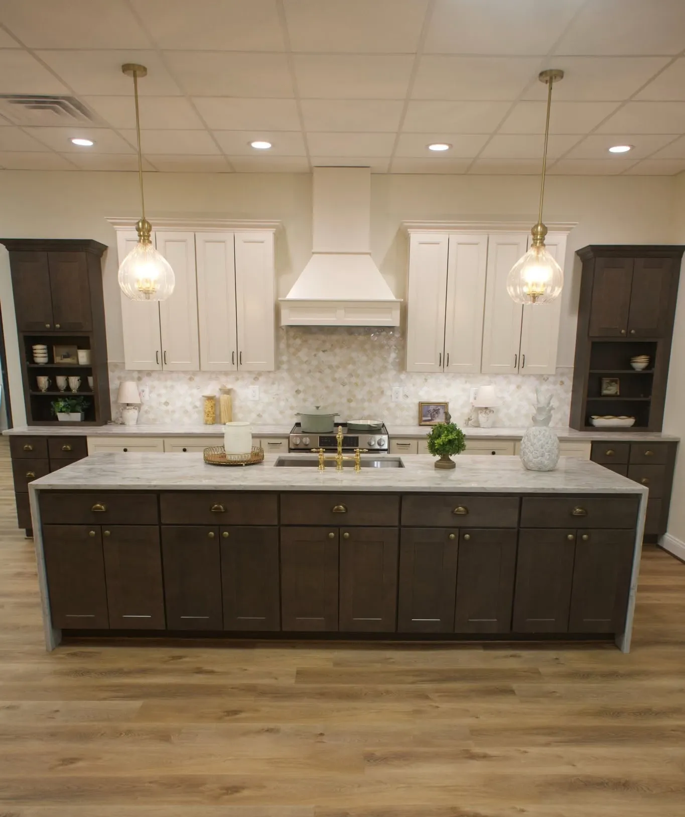 Cabinet America showroom display of cream inset-style kitchen cabinets