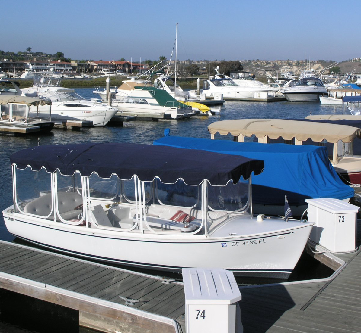 Photo of Slips with Electric Duffy Boats in Foreground