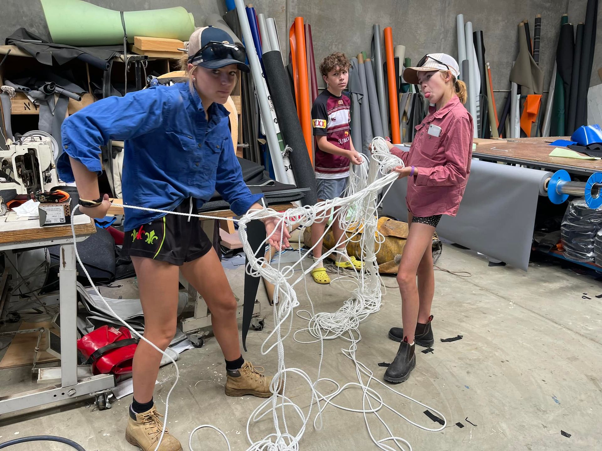 Red Boat With a Black Canopy — Glenvale Canvas Pty Ltd in Wilsonton, QLD