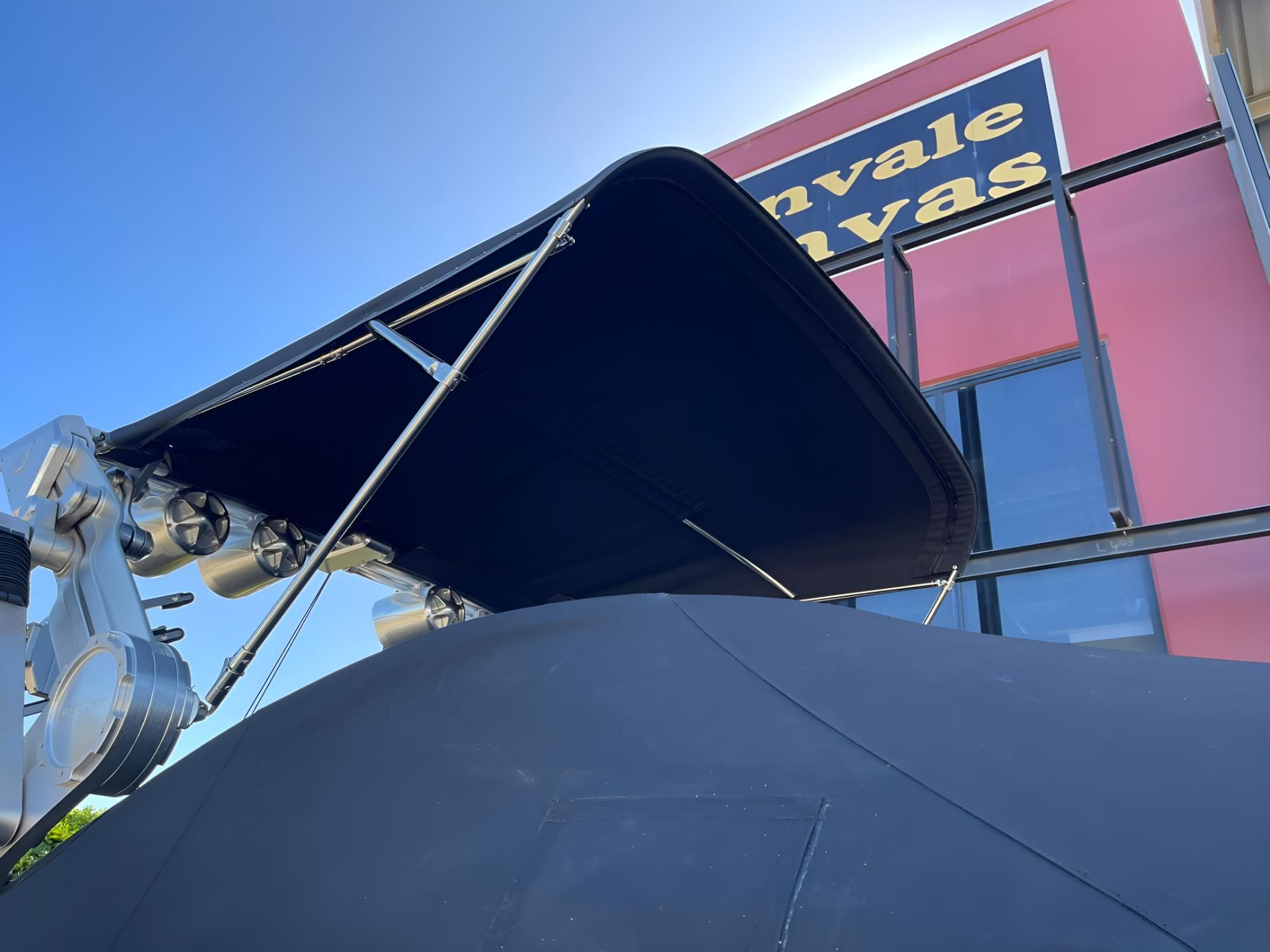 Boat is Parked in Front of a Building — Glenvale Canvas Pty Ltd in Wilsonton, QLD