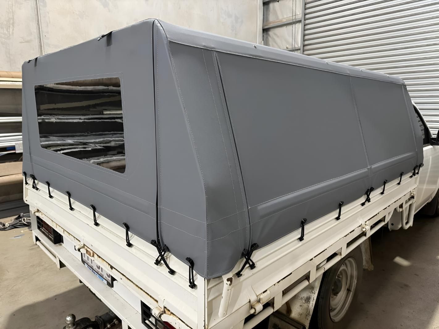 White Truck With a Gray Canopy on Top of It — Glenvale Canvas Pty Ltd in Wilsonton, QLD