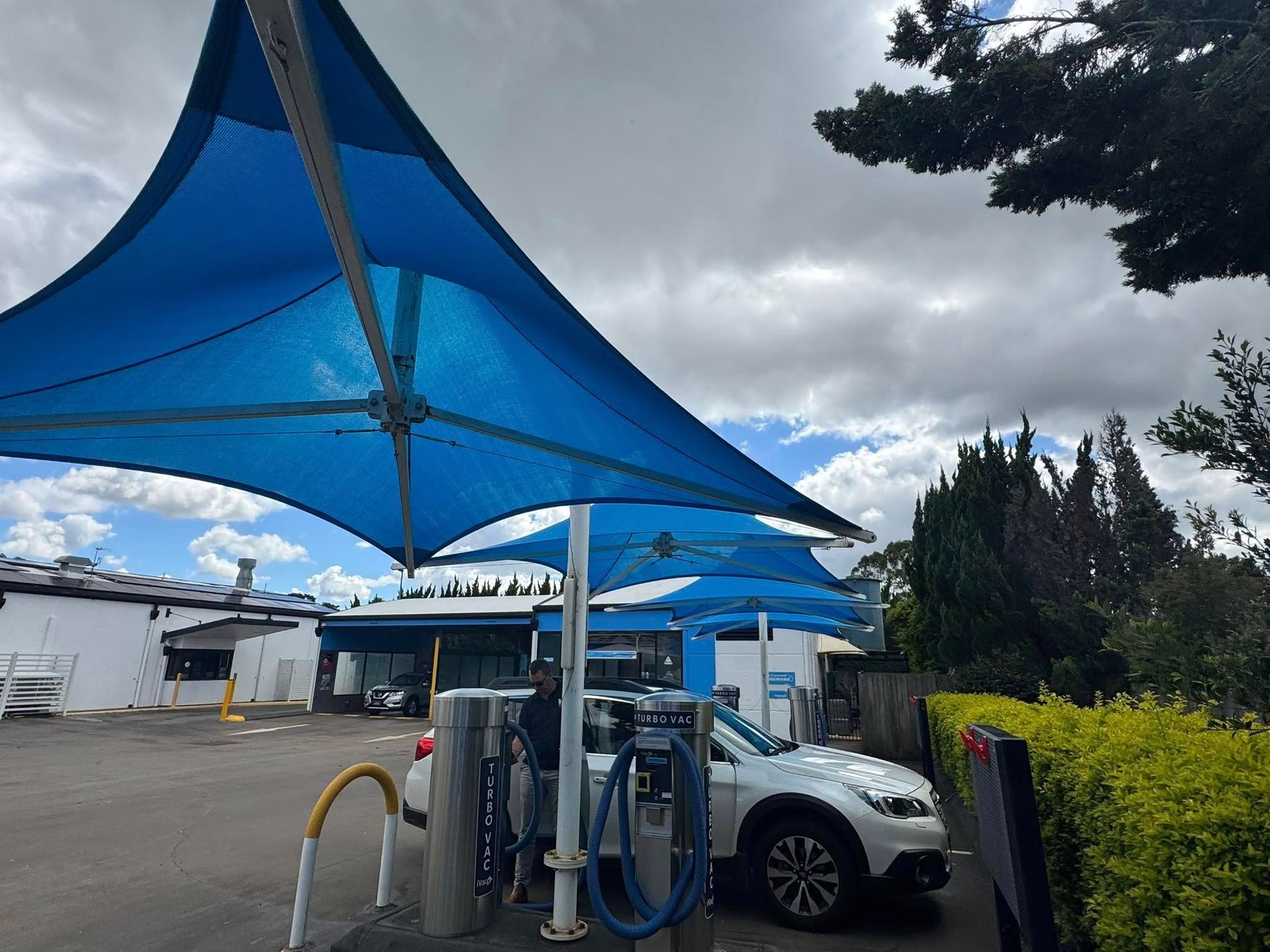 A Trailer with a Blue Tarp on It — Glenvale Canvas Pty Ltd in Wilsonton, QLD