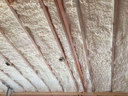 Spray foam insulation covering attic ceiling by Foam Insulation Solution in Yakima WA for thermal efficiency