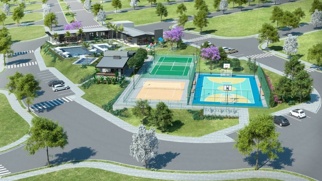 condominio-fechado Uma vista aérea de um parque com quadra de tênis e quadra de basquete.
