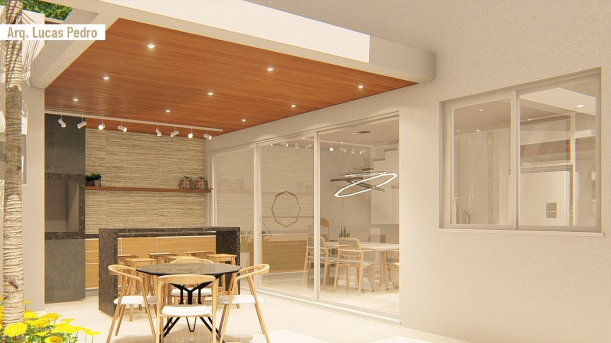 imovel-compacto Uma sala com mesa e cadeiras e teto de madeira