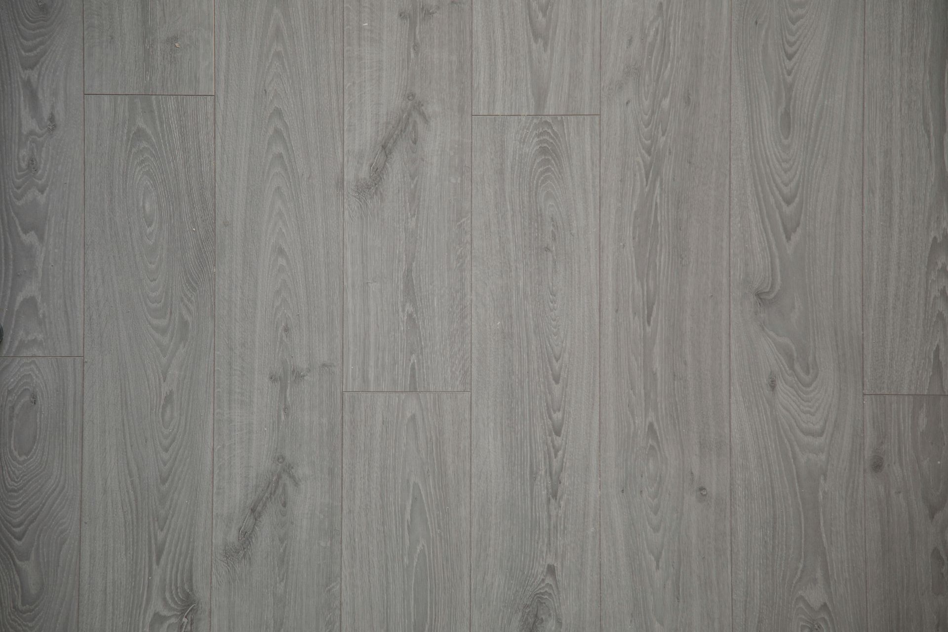 Gray wood-grain textured surface background