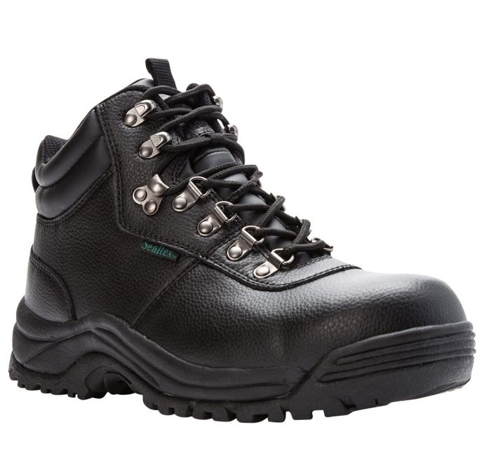 A pair of black hiking boots on a white background