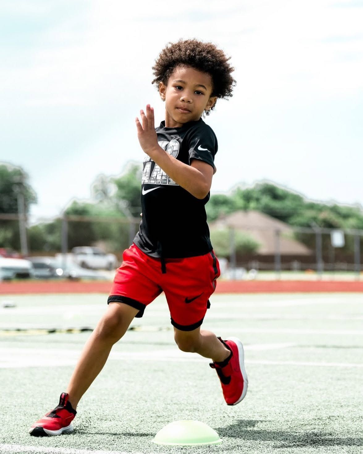 Young athlete practicing running skills with The Circle Performance