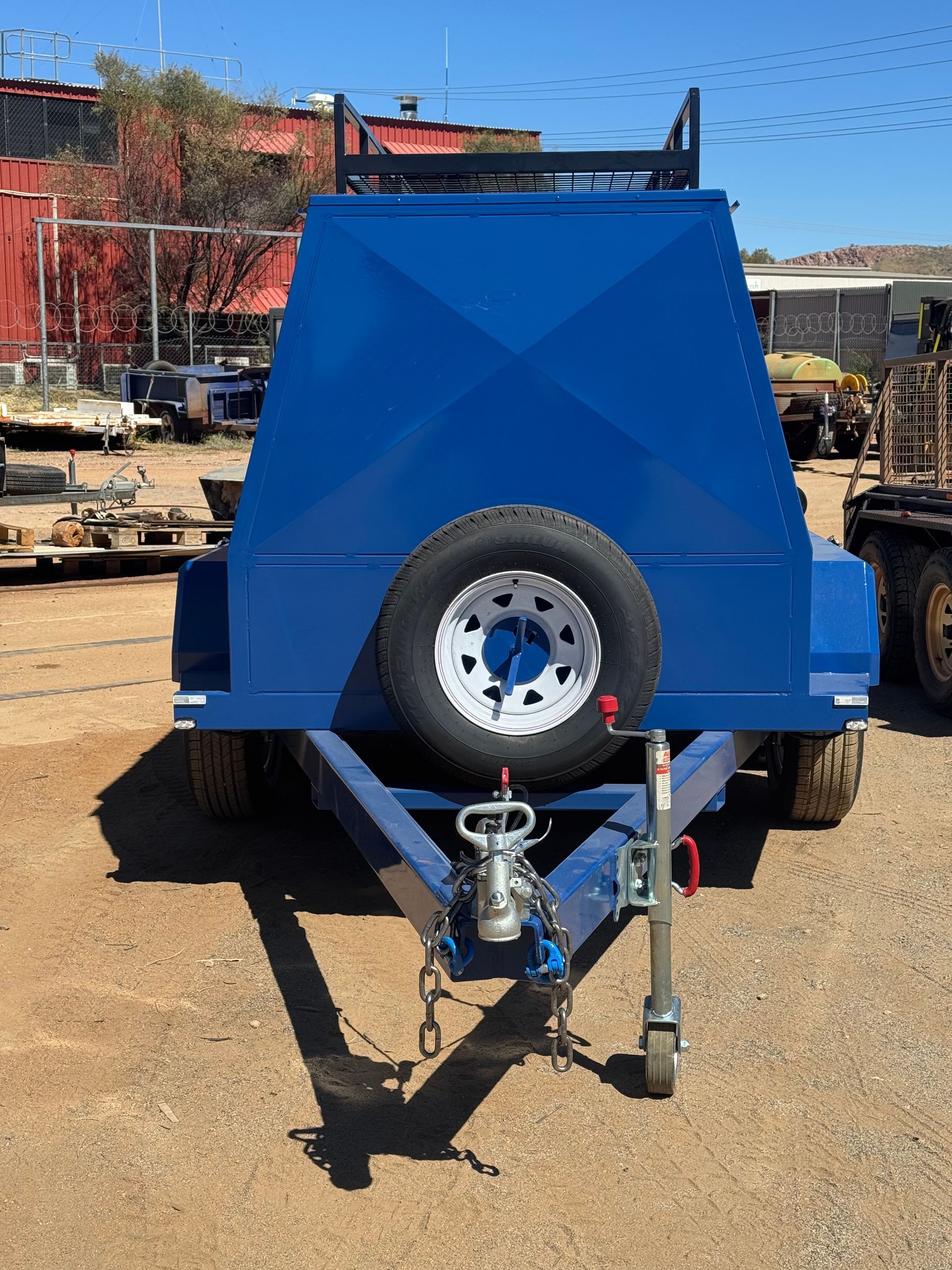 Blue Utility Trailer with A Spare Tire Mounted on The Back — Centre Trailer Sales In Alice Springs, NT