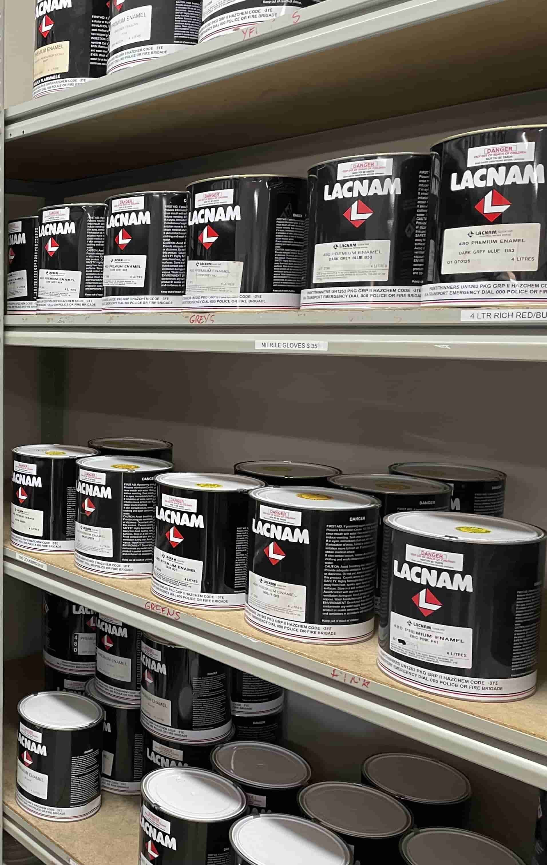 A Shelf Filled With Lots Of Cans Of Paint — Centre Trailer Sales In Alice Springs, NT
