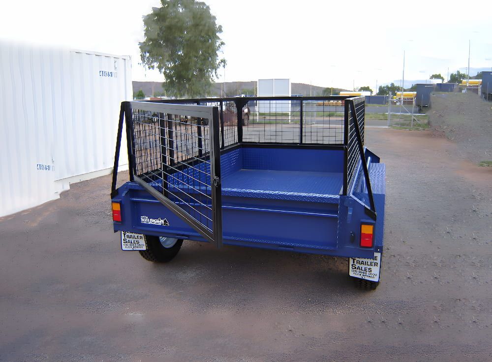 A Blue Trailer Is Parked in A Parking Lot — Centre Trailer Sales In Alice Springs, NT