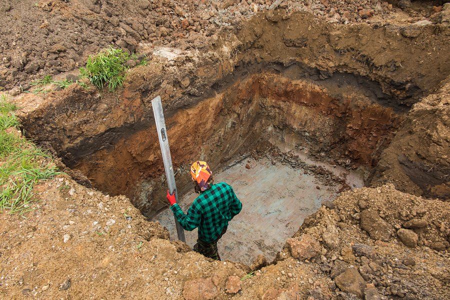 man digging the ground