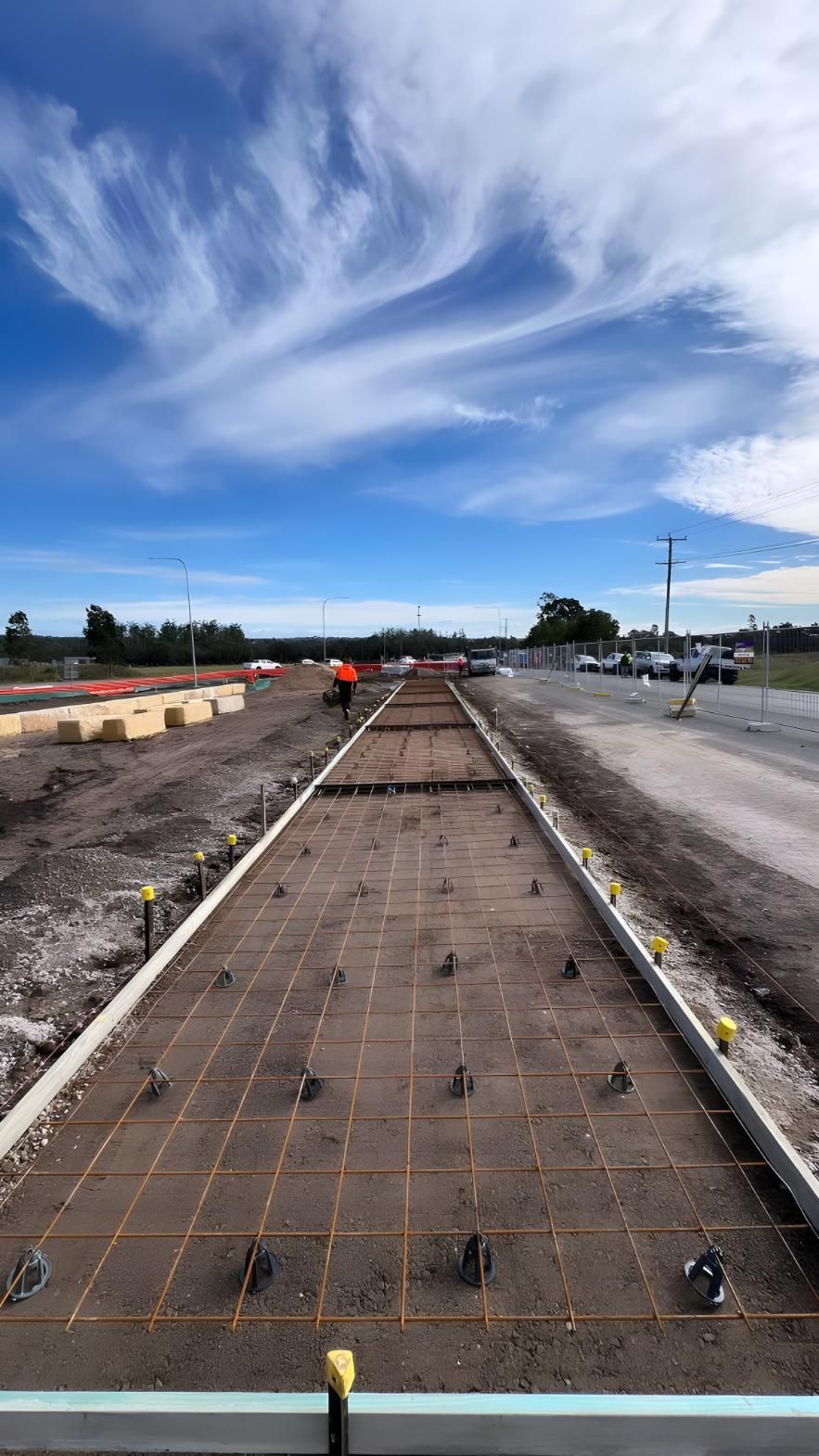 A Road Under Construction With a Blue Sky in the Background — Coastal Kerb and Concrete In Hunter Valley, NSW
