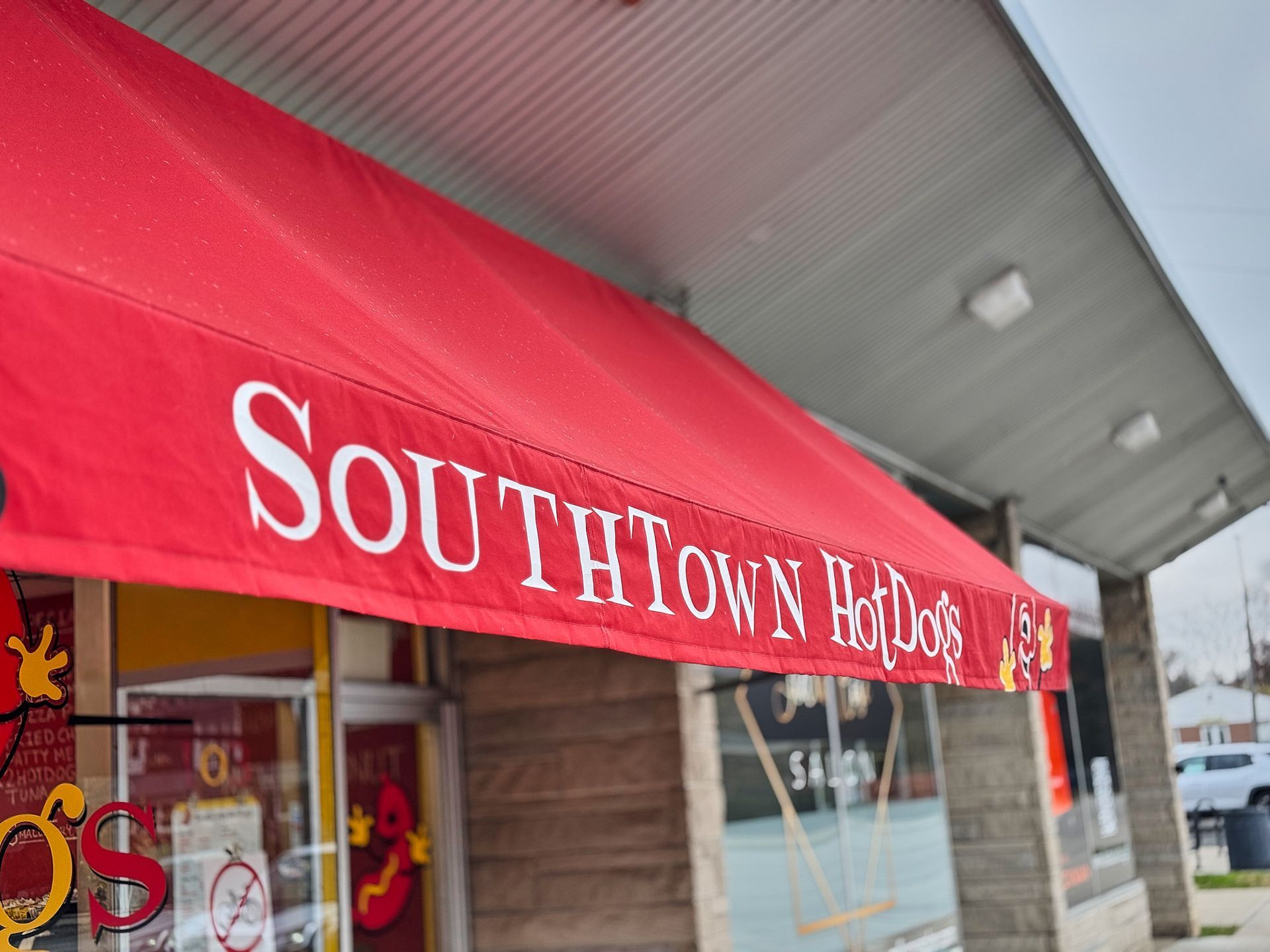 Red awning of 
