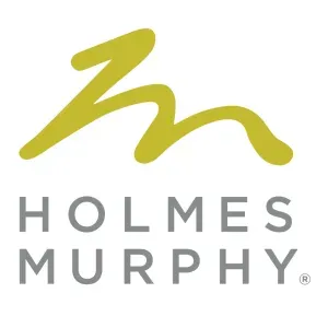 Holmes Murphy logo with yellow abstract mark above gray text