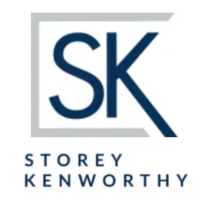 Storey Kenworthy logo with blue “SK” letters and gray framing lines on a white background