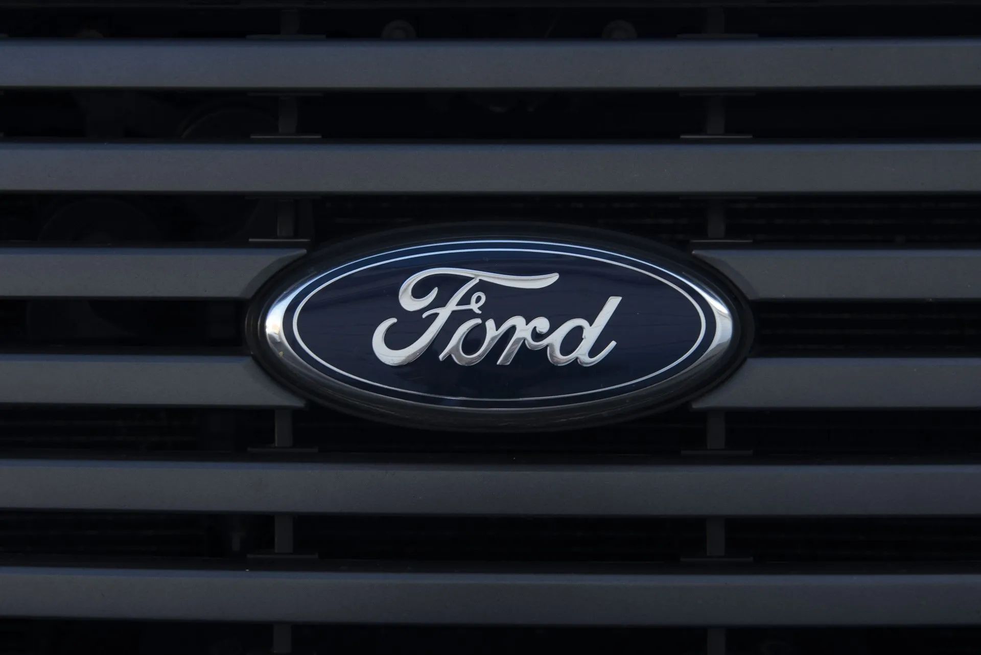 Ford logo on a black grille