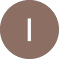 Brown circular icon with a white vertical line in the center